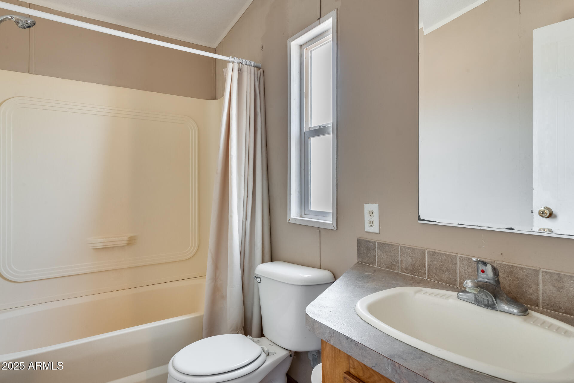 1047 South Main Street Coolidge, AZ 85128 - Photo 23 of 72 a bathroom with a sink toilet and shower