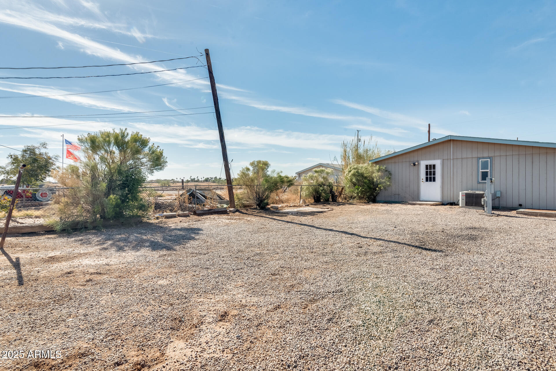 1047 South Main Street Coolidge, AZ 85128 - Photo 34 of 72 a view of a house with a yard