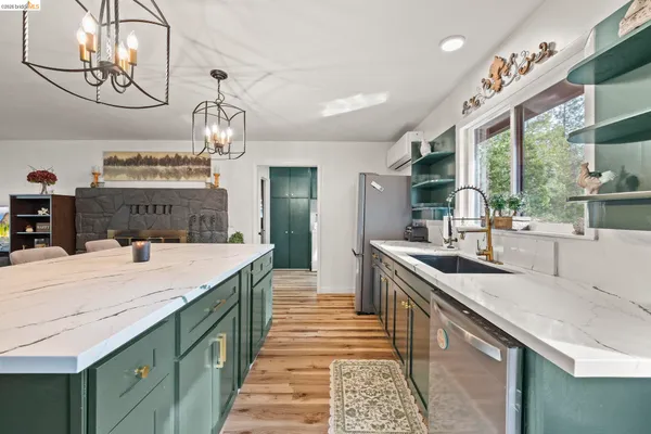 a bedroom with furniture and a rug