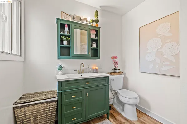 a bathroom with a sink and mirror