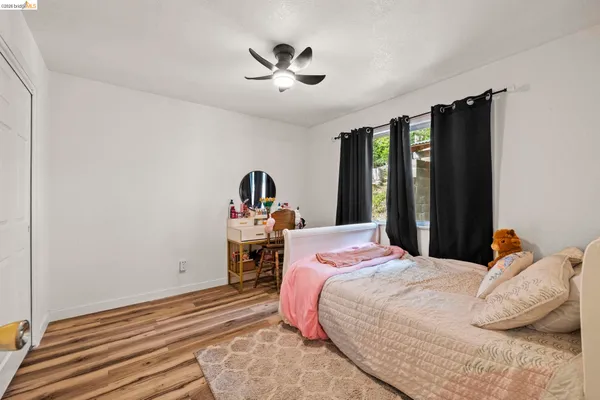 a view of balcony with furniture and wooden deck