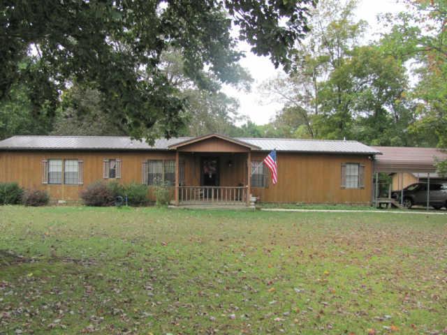 212 Duckworth Road Winchester, TN 37398 - Photo 2 of 16 a front view of a house with garden