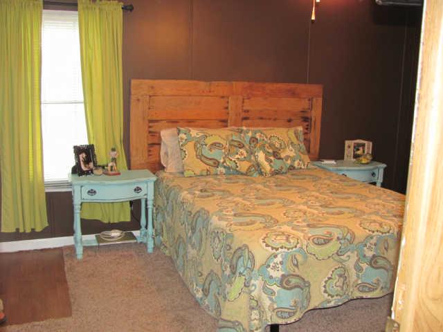 212 Duckworth Road Winchester, TN 37398 - Photo 5 of 16 a bedroom with a bed and a window