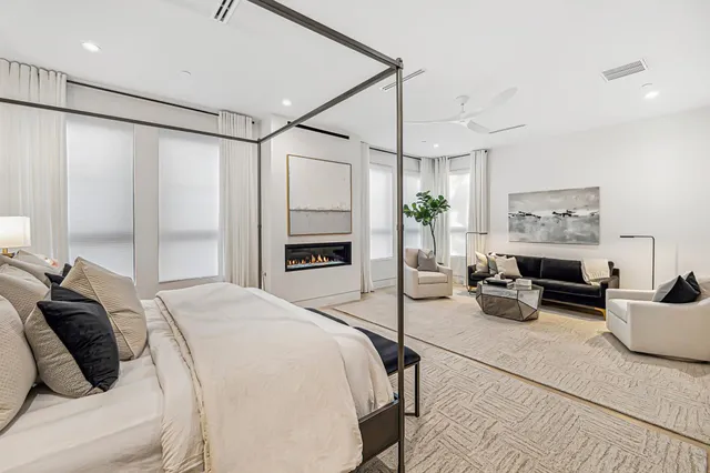 a bathroom with a tub a shower and a sink