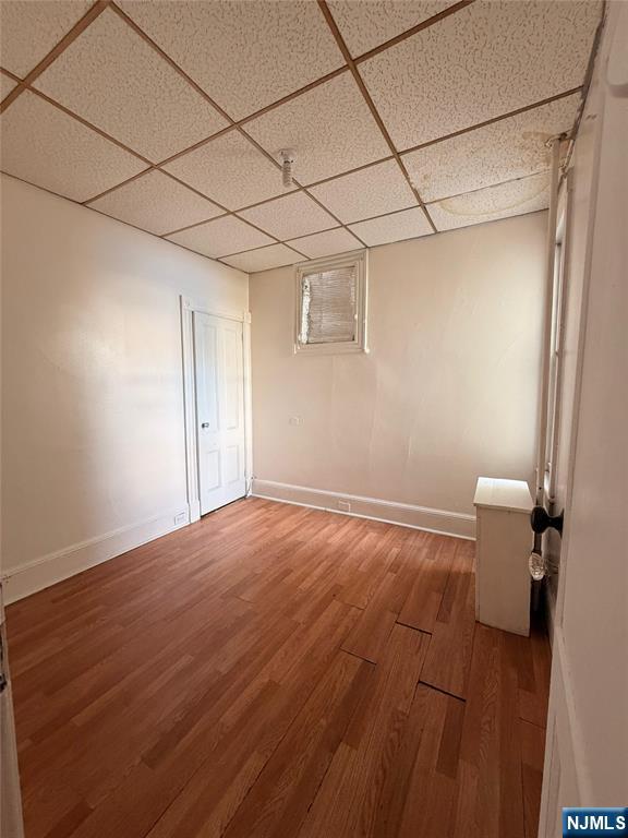 113 Martin Street, Unit 1 Paterson, NJ 07501 - Photo 9 of 14 a view of a room with wooden floor