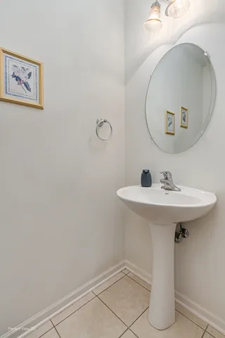 a bathroom with a sink and mirror