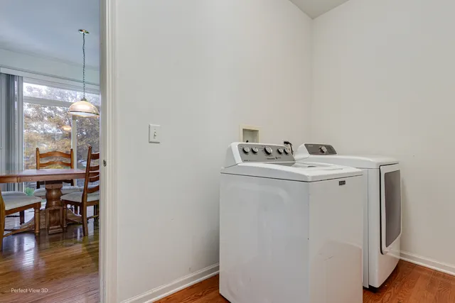 a utility room with washer and dryer