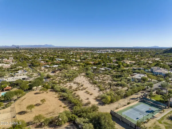 an aerial view of residential house and ocean