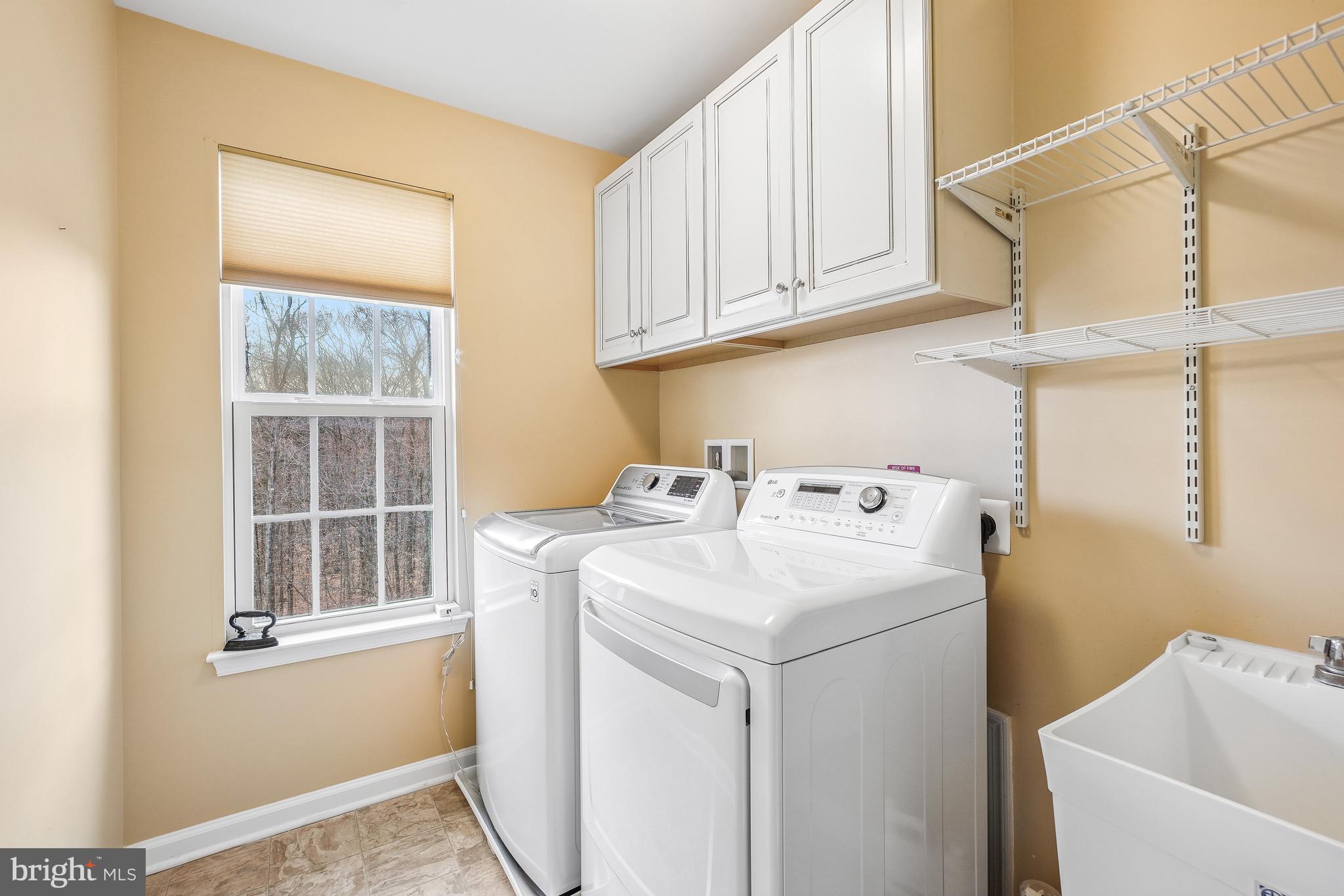 4463 Weejun Loop Woodbridge, VA 22192 - Photo 31 of 43 Upstairs Laundry