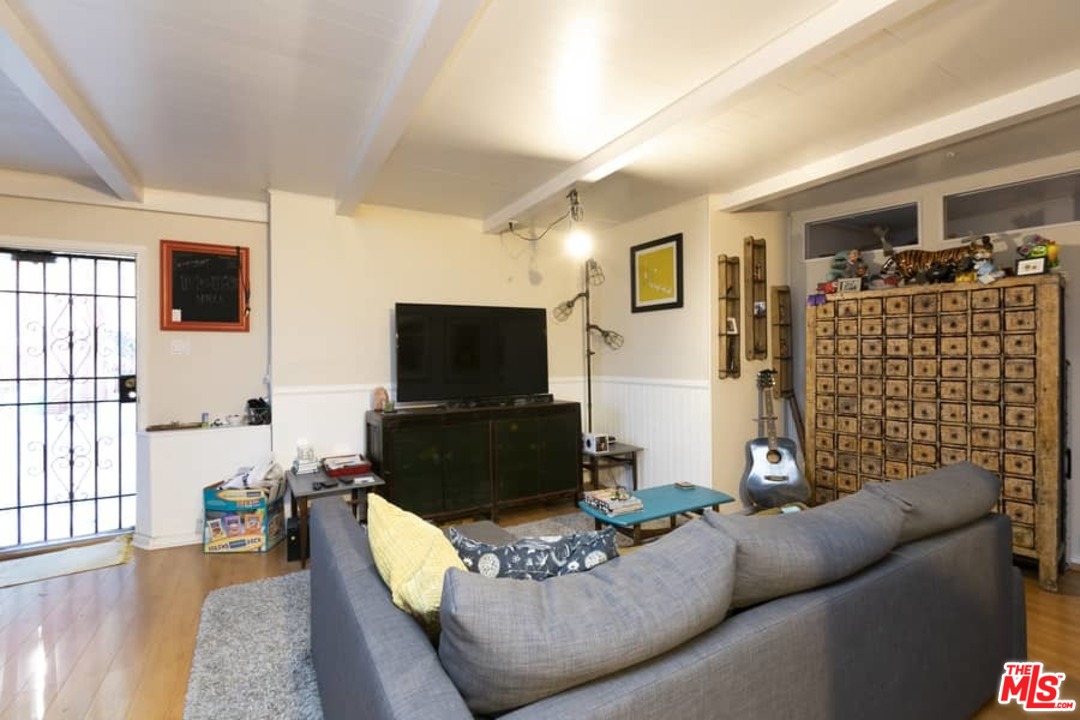 3729 Roderick Road Los Angeles, CA 90065 - Photo 36 of 40 a living room with furniture and a flat screen tv