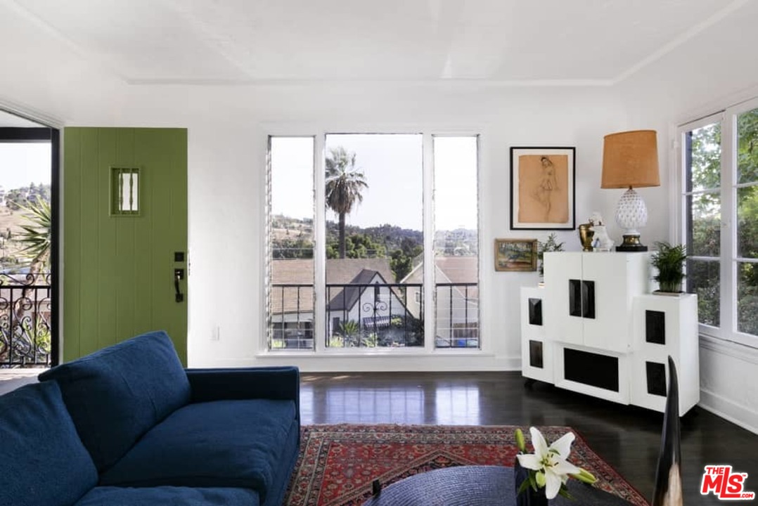 3729 Roderick Road Los Angeles, CA 90065 - Photo 5 of 40 a living room with furniture and a fireplace