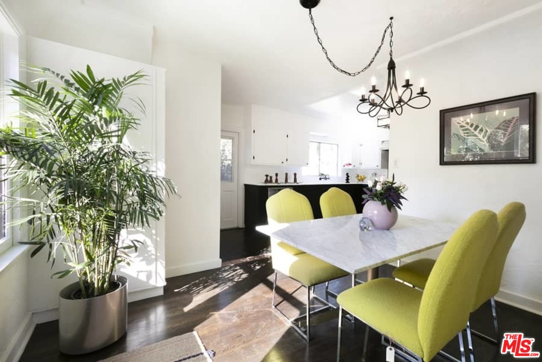 3729 Roderick Road Los Angeles, CA 90065 - Photo 8 of 40 a dining room with furniture and a potted plant