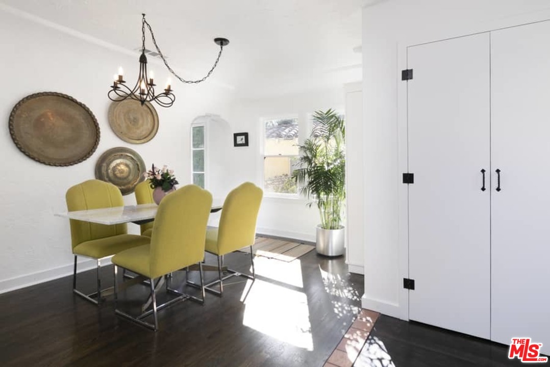 3729 Roderick Road Los Angeles, CA 90065 - Photo 9 of 40 a view of a dining room with furniture and wooden floor