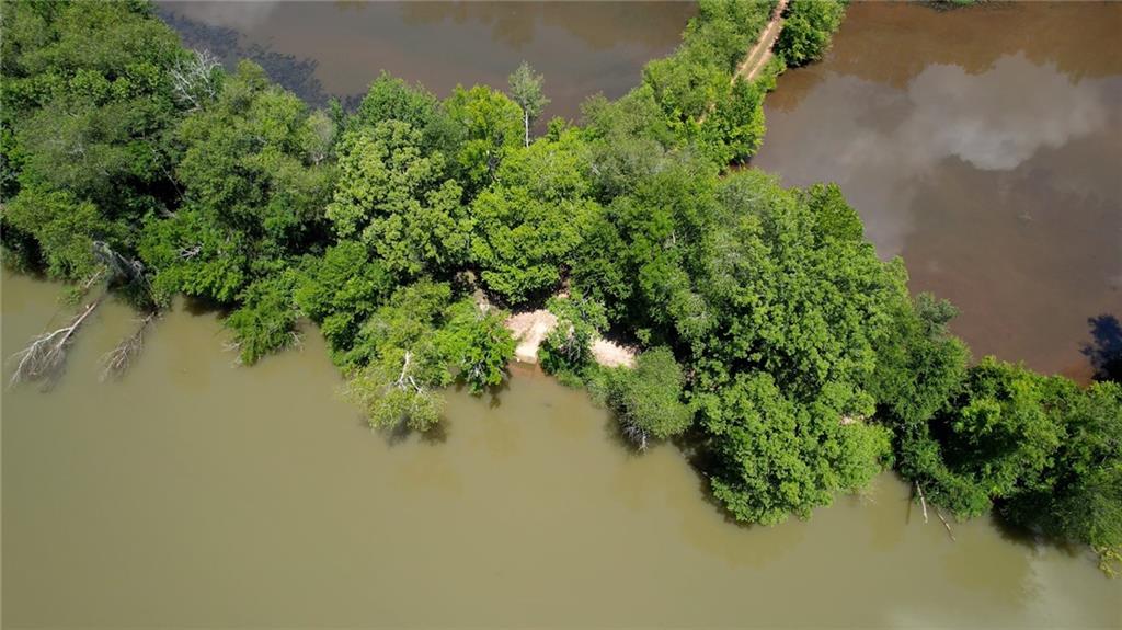 16653 Highway 36 Covington, GA 30014 - Photo 17 of 54 an aerial view of a houses with a lake view