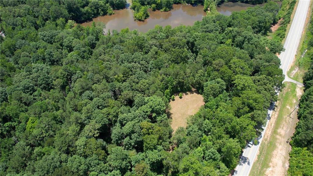 16653 Highway 36 Covington, GA 30014 - Photo 22 of 54 an aerial view of a house with a yard and street view