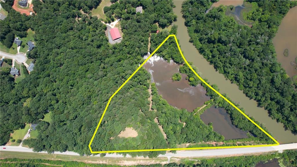 16653 Highway 36 Covington, GA 30014 - Photo 26 of 54 a view of a yard with a fountain