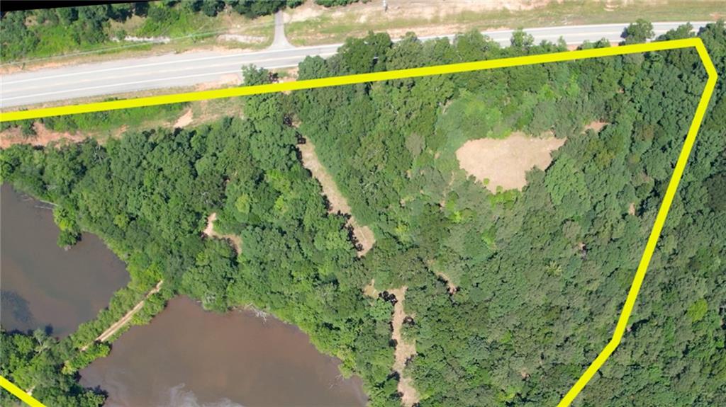 16653 Highway 36 Covington, GA 30014 - Photo 29 of 54 a view of a swimming pool with a yard