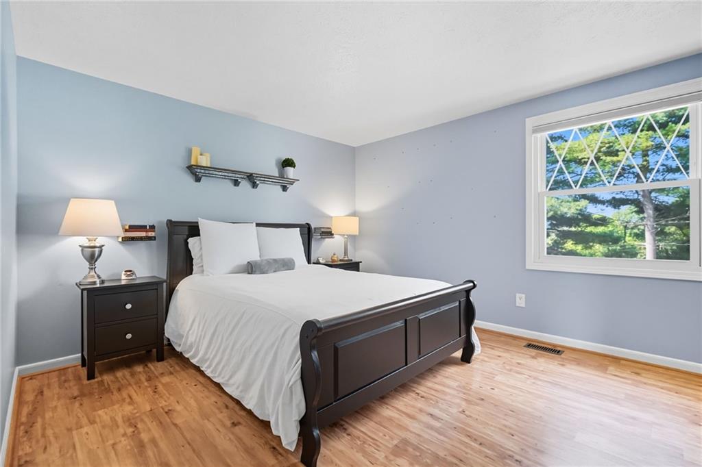 106 Kings Point Road Glenshaw, PA 15116 - Photo 18 of 49 a bedroom with a bed and window