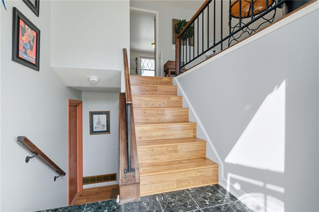 106 Kings Point Road Glenshaw, PA 15116 - Photo 25 of 49 a view of entryway and hall with wooden floor