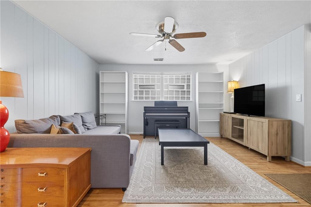 106 Kings Point Road Glenshaw, PA 15116 - Photo 29 of 49 a living room with furniture and a flat screen tv