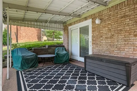 a view of a house with patio
