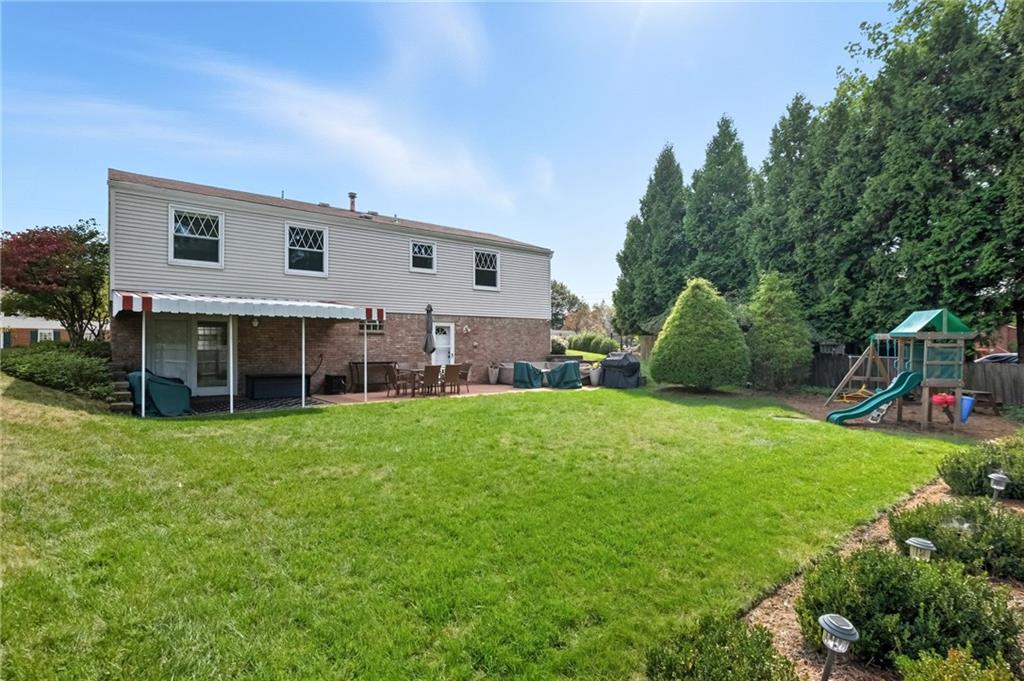 106 Kings Point Road Glenshaw, PA 15116 - Photo 38 of 49 a view of a house with backyard and porch