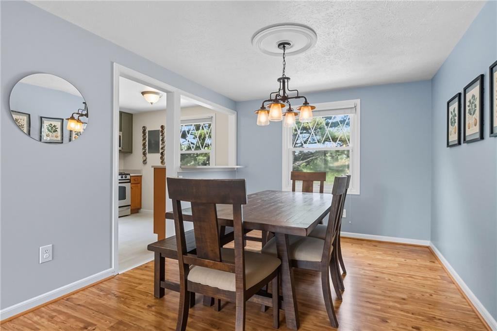 106 Kings Point Road Glenshaw, PA 15116 - Photo 9 of 49 a view of a dining room with furniture window and wooden floor