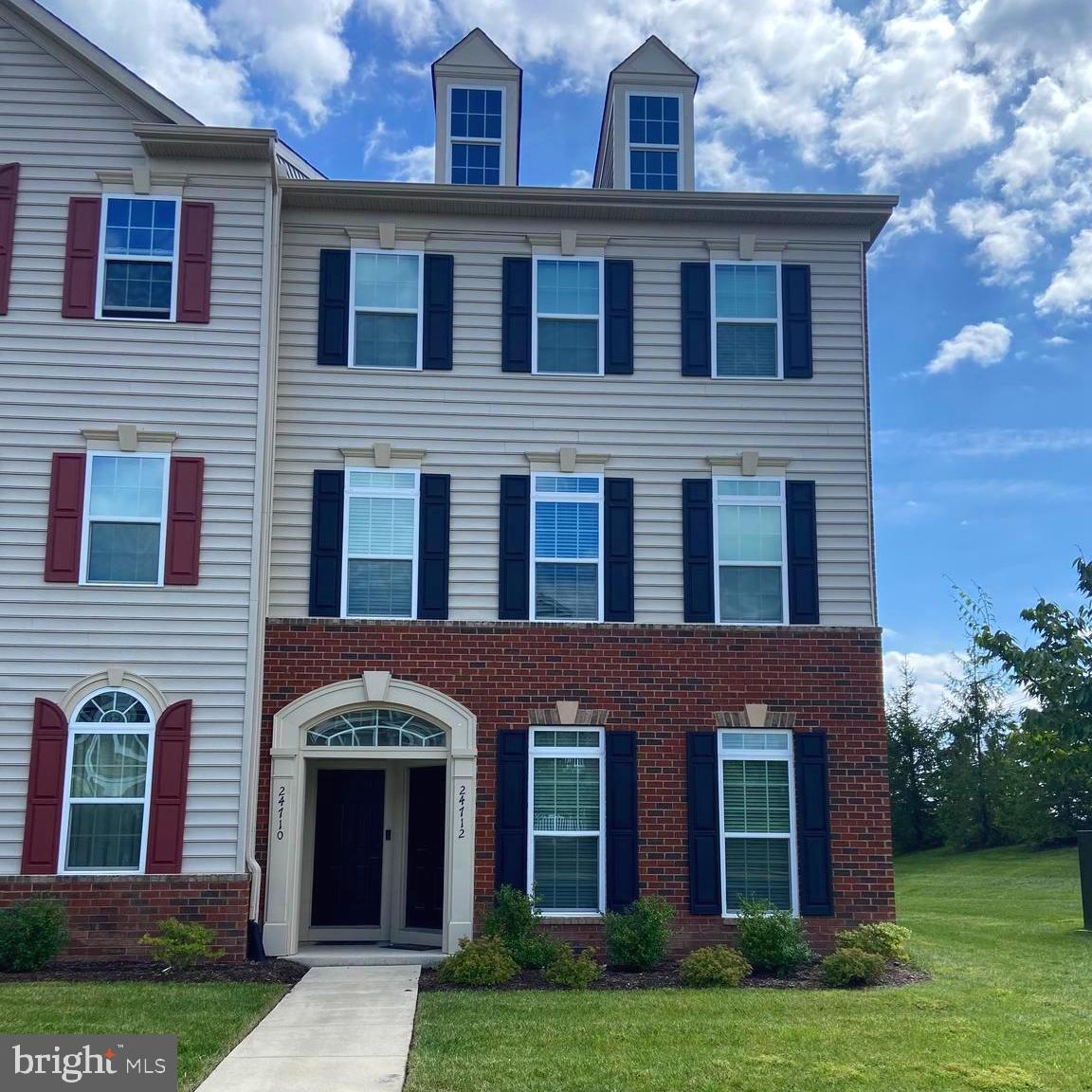 24710 Hutchinson Farm Drive Sterling, VA 20166 - Photo 1 of 30 a front view of a house