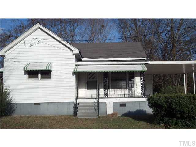 713 Raleigh Street Oxford, NC 27565 - Photo 1 of 3 a black and white photo of a house
