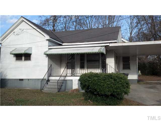 713 Raleigh Street Oxford, NC 27565 - Photo 3 of 3 a black and white photo of a house