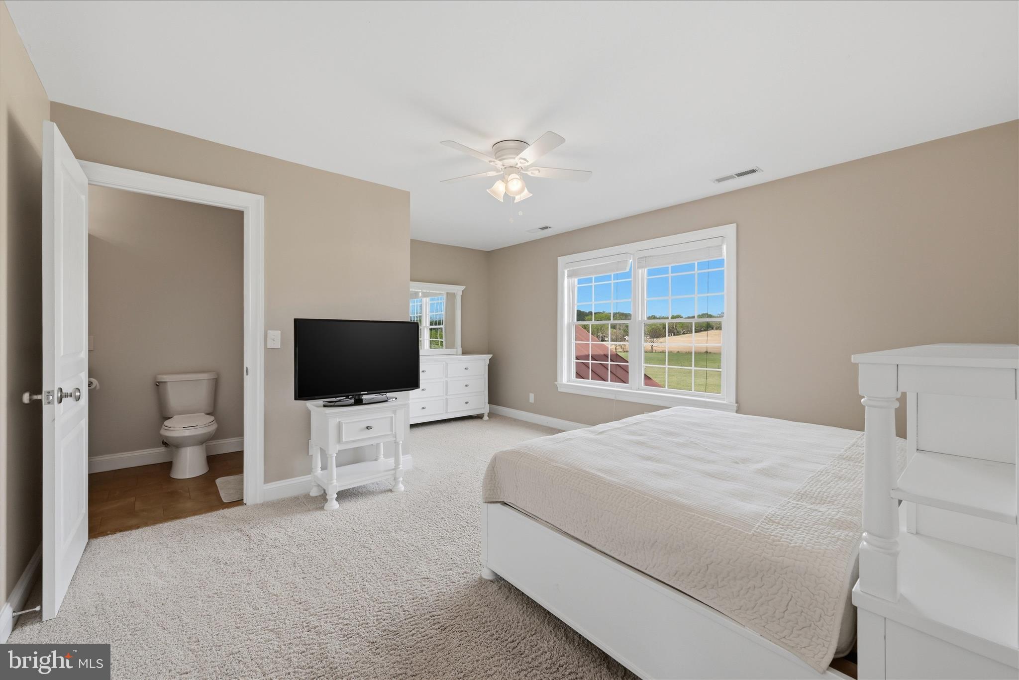 2230 Jones Road Winchester, VA 22602 - Photo 37 of 83 a bedroom with a bed and a flat screen tv