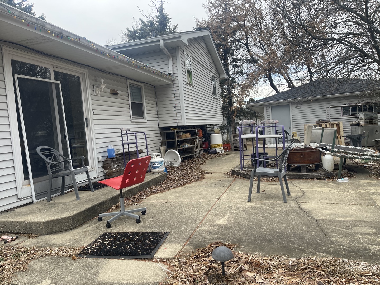 5S345 North Naperville Wheaton Road Naperville, IL 60563 - Photo 4 of 8 a view of a chairs and tables in the back yard of the house