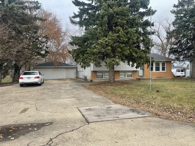 a car parked in front of a house