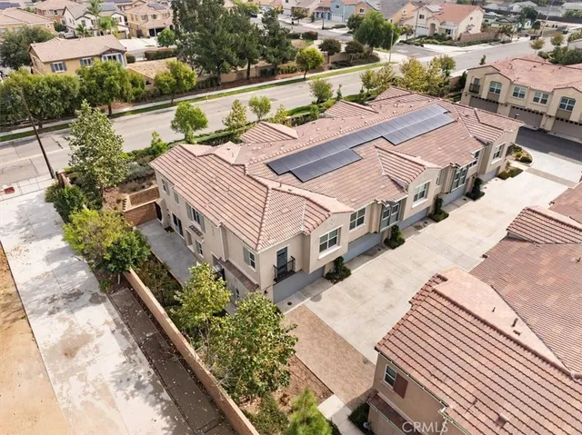 a small pool with a table and chairs