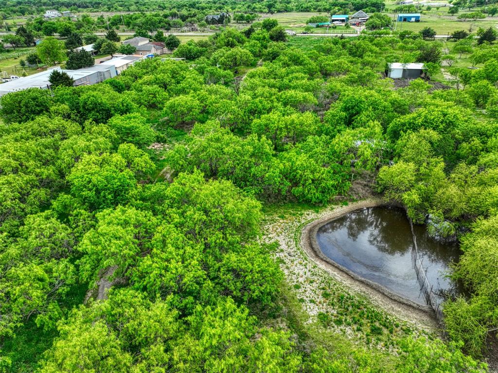 206 185th Rice, TX 75155 - Photo 4 of 23 an aerial view of a house with a yard