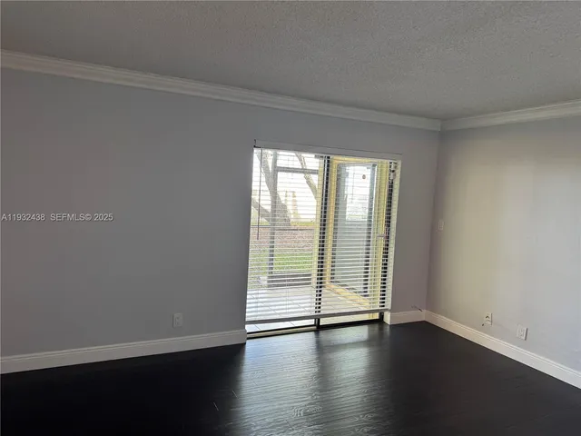 a kitchen with a stove microwave and refrigerator