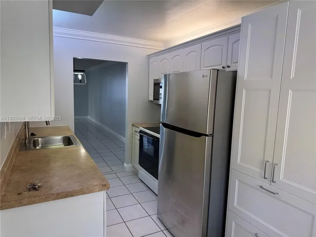 a view of a bathroom with a window