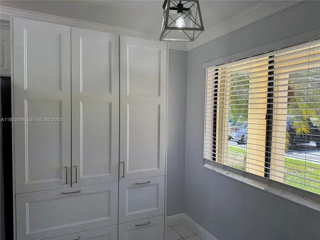 a view of a park with swings and slides