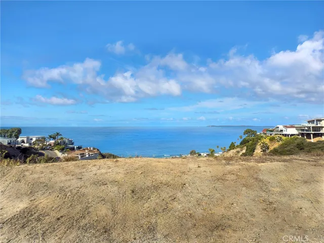 a view of a lake with a mountain in the background