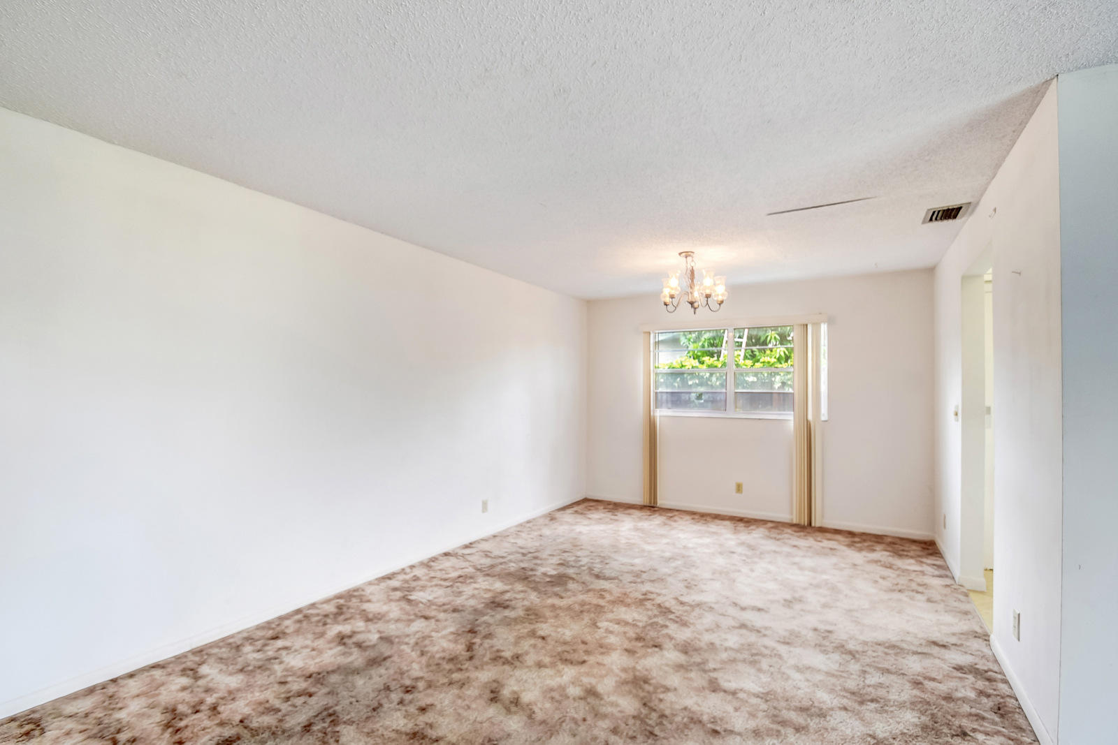9231 Southwest 16th Road East Boca Raton, FL 33428 - Photo 11 of 32 an empty room with windows