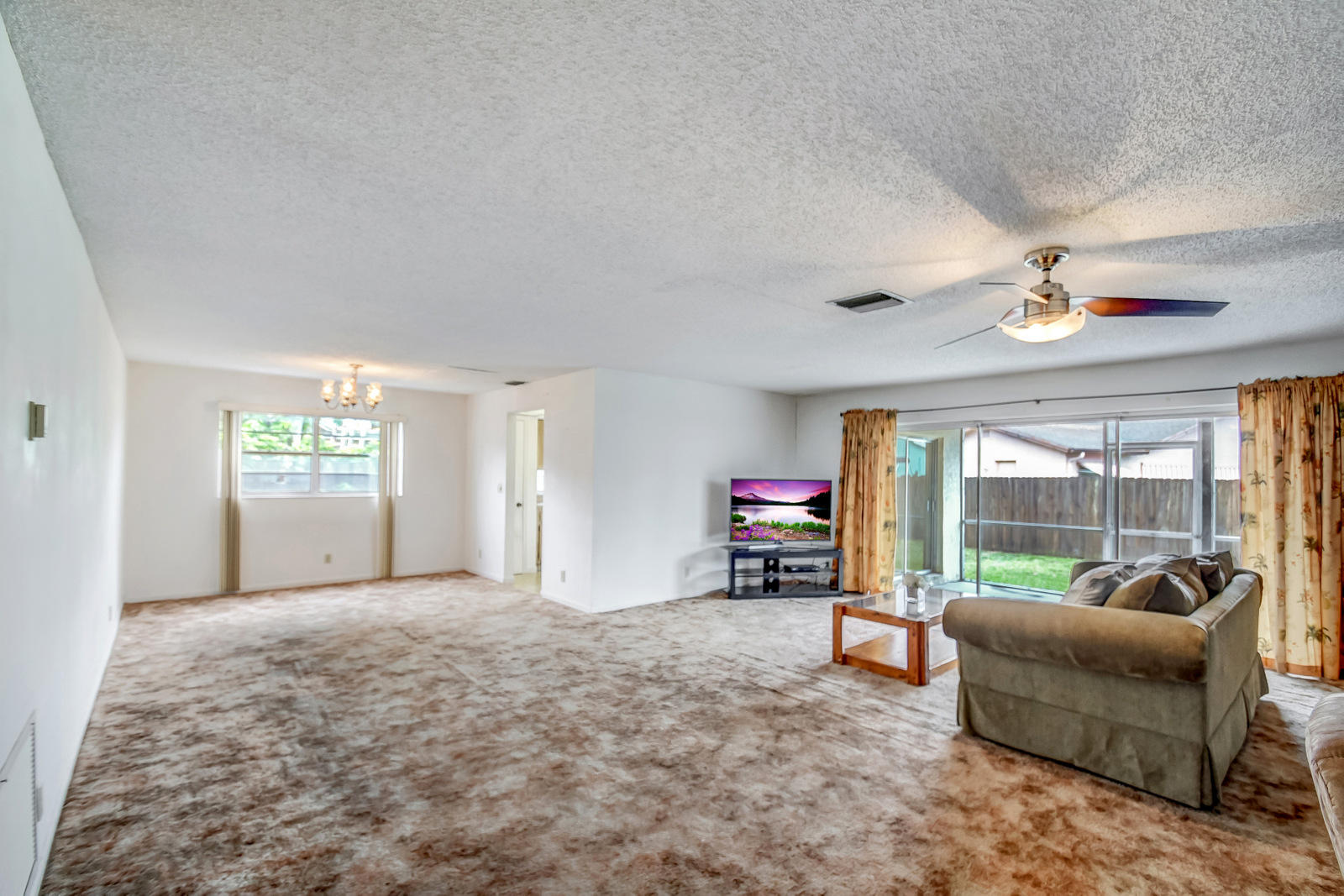 9231 Southwest 16th Road East Boca Raton, FL 33428 - Photo 5 of 32 a view of livingroom with furniture and window