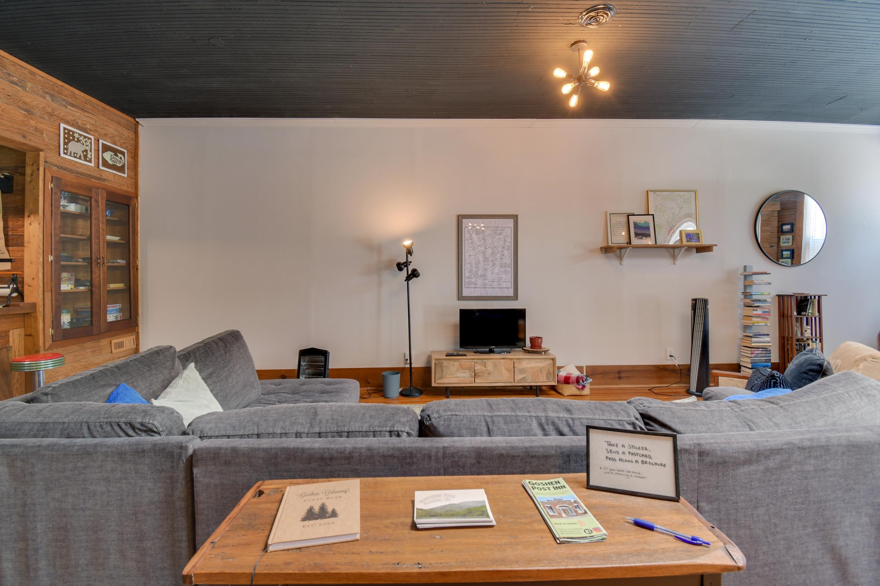 132 Main Street Goshen, VA 24439 - Photo 13 of 33 a living room with furniture and a clock
