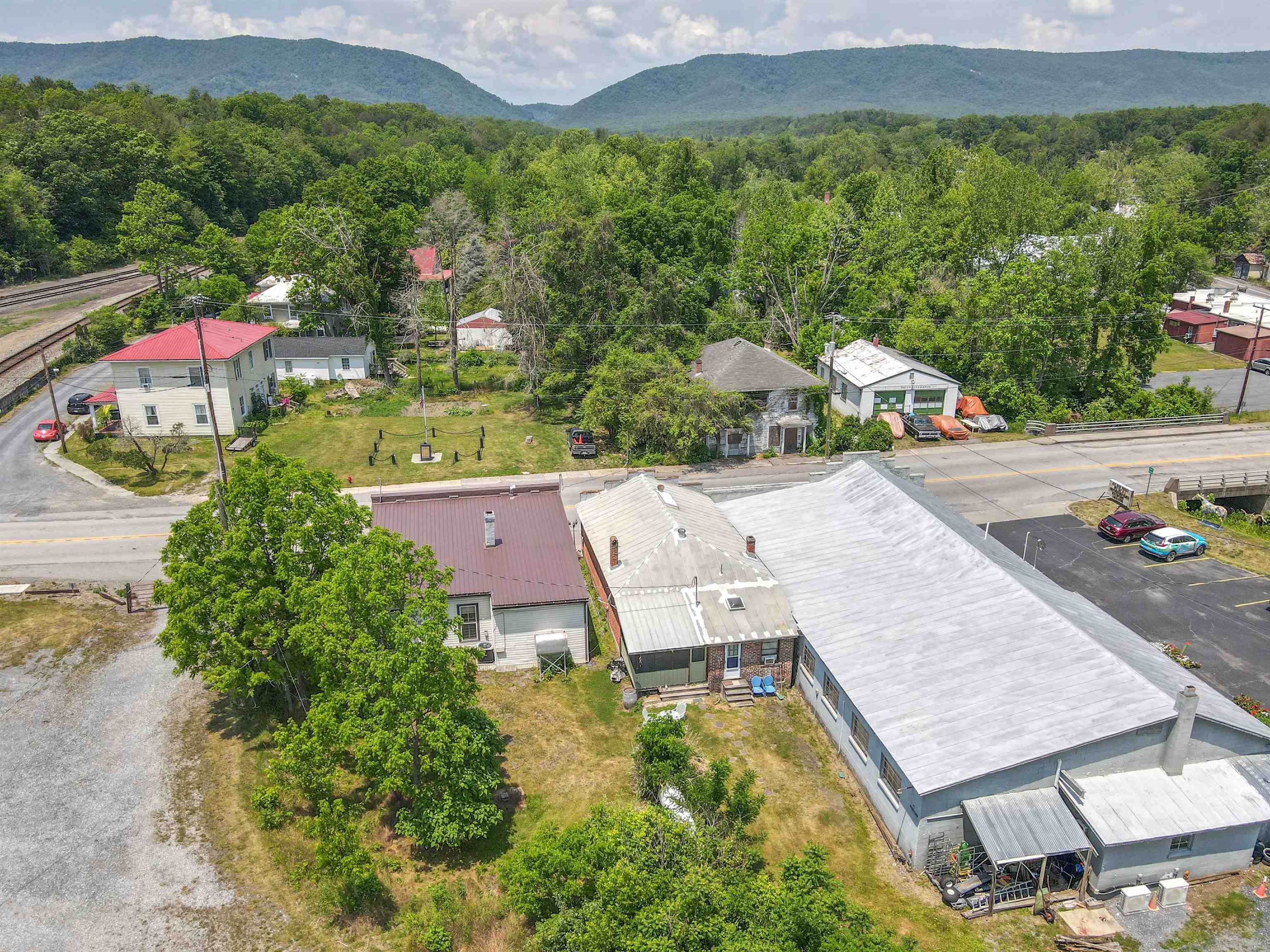 132 Main Street Goshen, VA 24439 - Photo 27 of 33 an aerial view of a house with swimming pool and a yard
