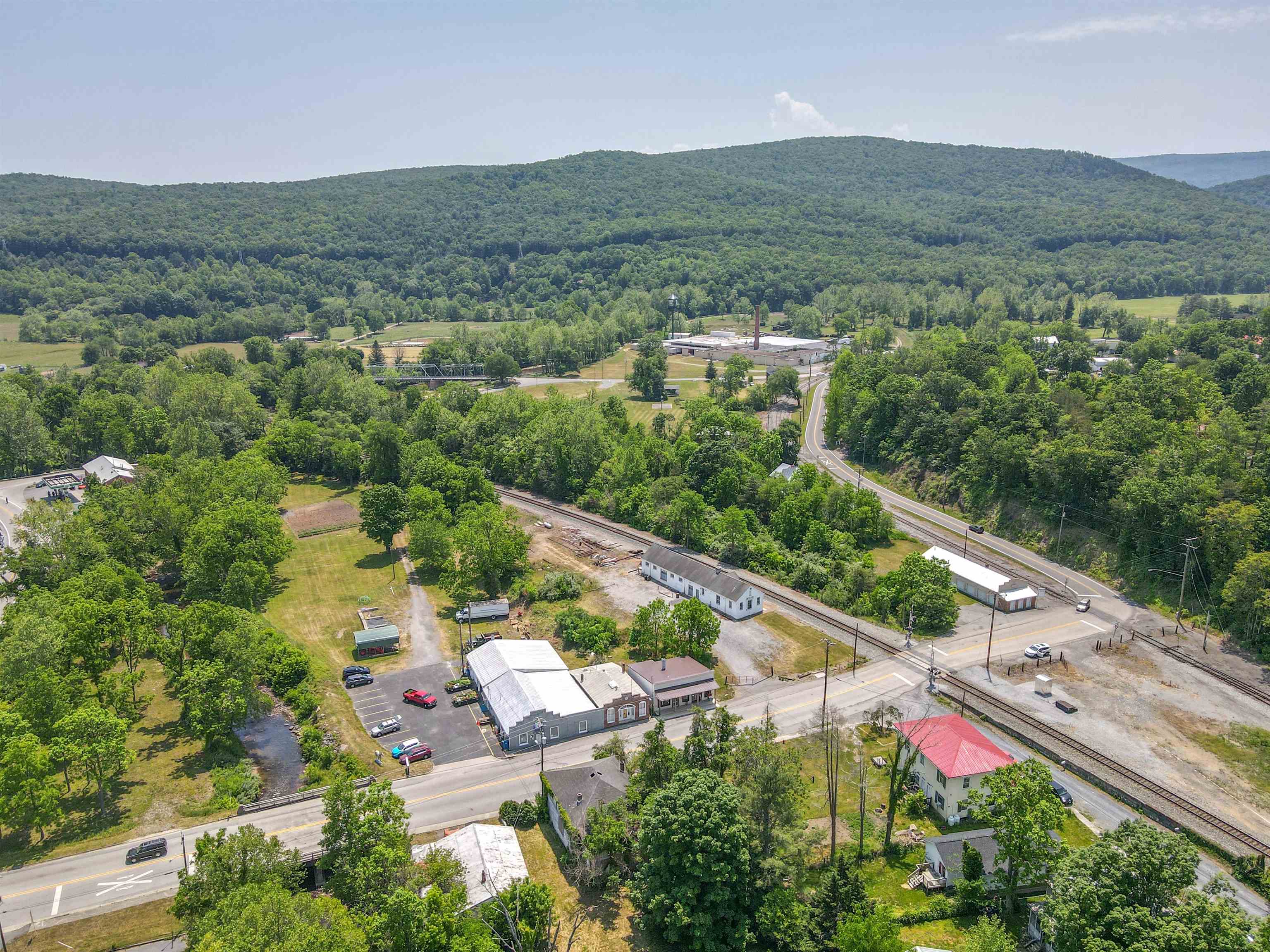132 Main Street Goshen, VA 24439 - Photo 29 of 33 an aerial view of residential houses with outdoor space and trees