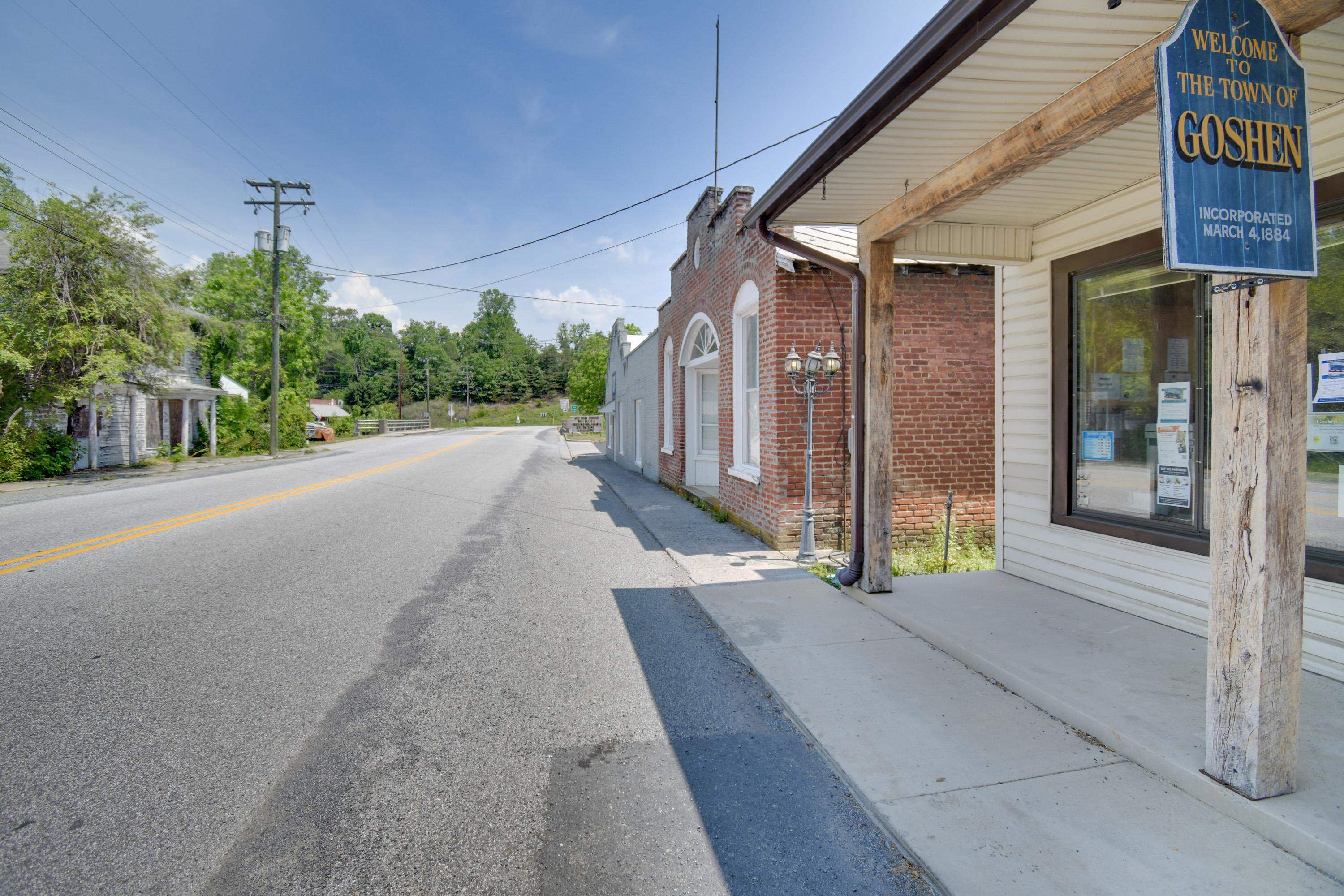 132 Main Street Goshen, VA 24439 - Photo 3 of 33 a view of a house with backyard and garden