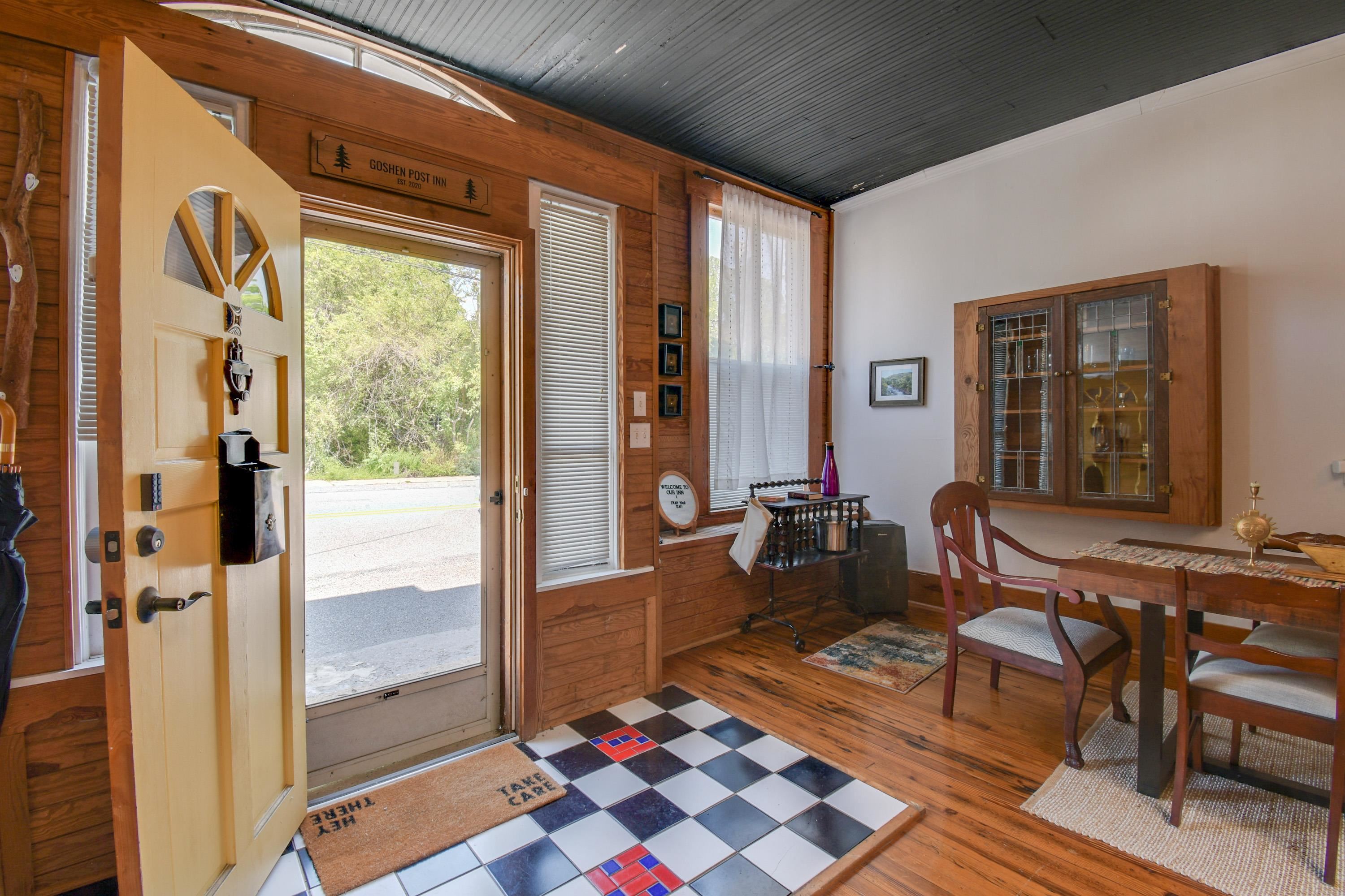132 Main Street Goshen, VA 24439 - Photo 4 of 33 a living room with furniture and a window
