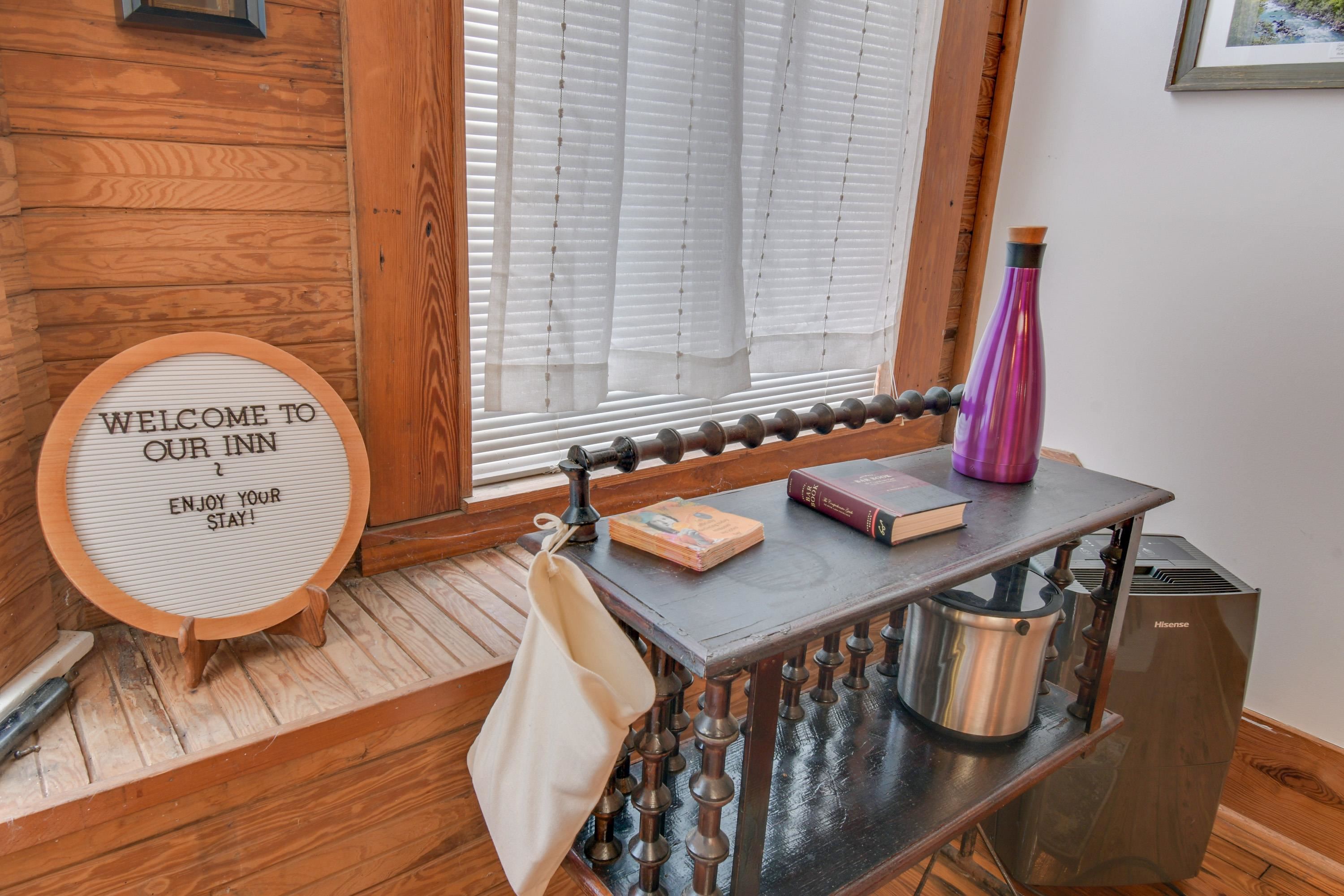 132 Main Street Goshen, VA 24439 - Photo 6 of 33 a view of a dining room with furniture and wooden floor