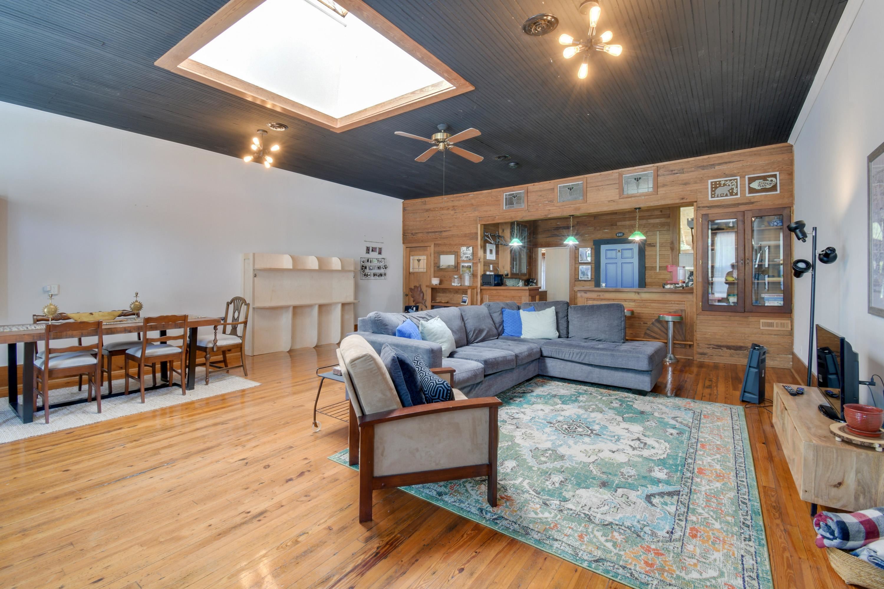 132 Main Street Goshen, VA 24439 - Photo 8 of 33 a living room with furniture and a wooden floor