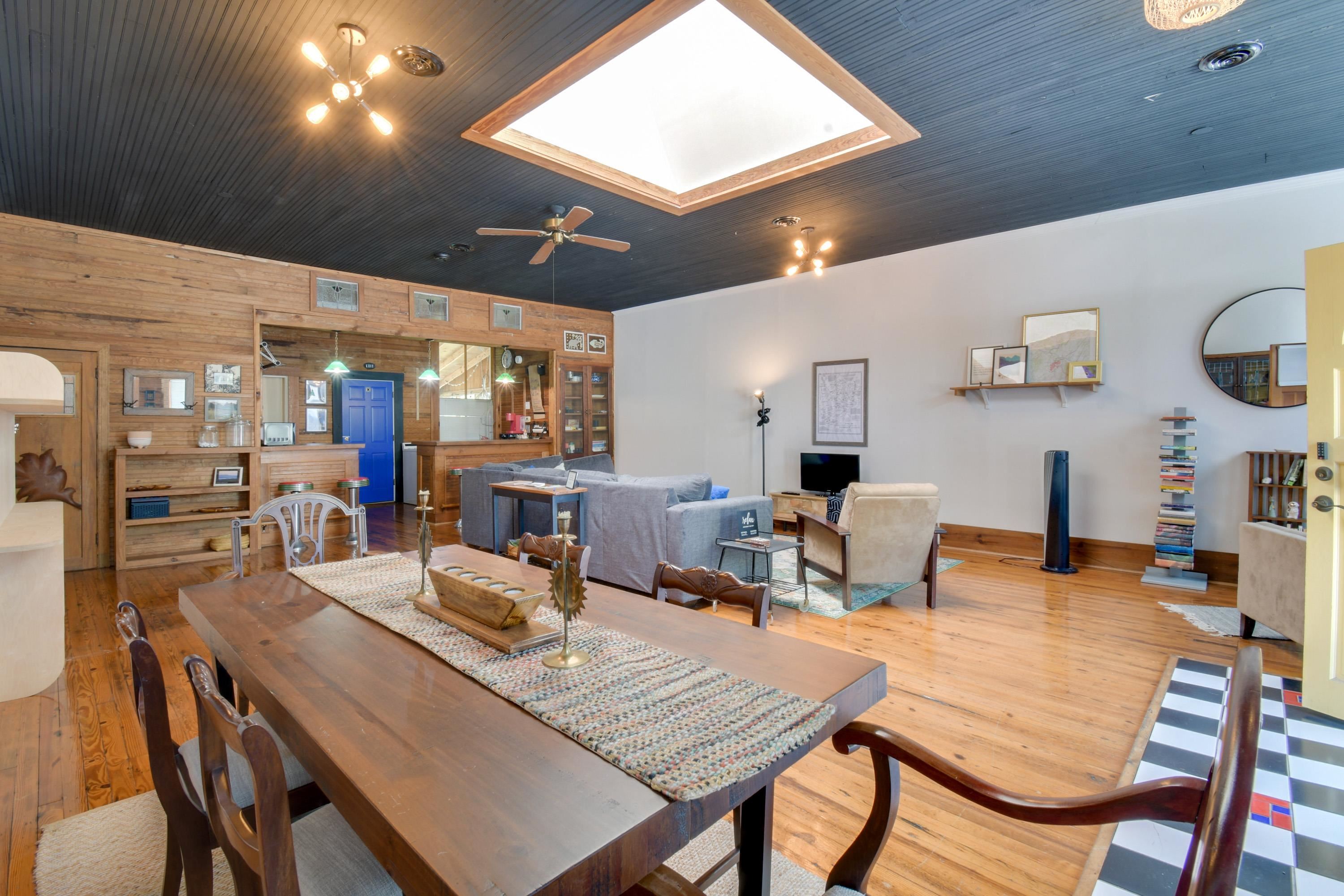 132 Main Street Goshen, VA 24439 - Photo 9 of 33 a living room with fireplace furniture and a wooden floor