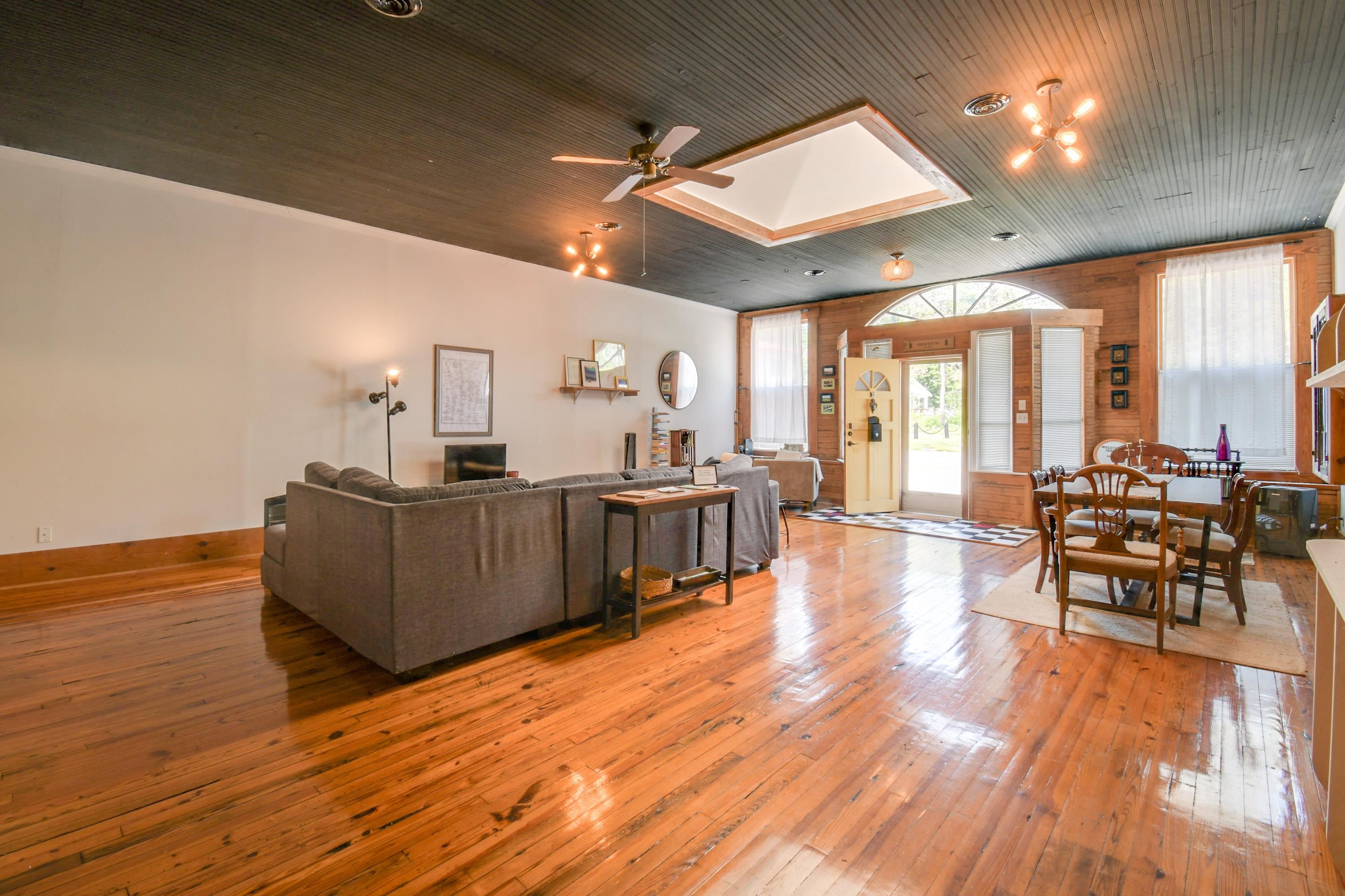 132 Main Street Goshen, VA 24439 - Photo 10 of 33 a living room with furniture and a wooden floor